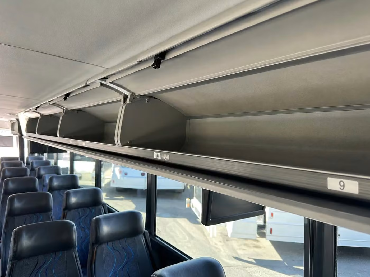 opelika 56 passenger charter bus overhead storage